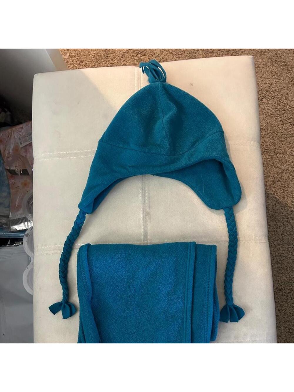 Blue front scarf and fleece ear flap hat with fringe and braided ties bundle